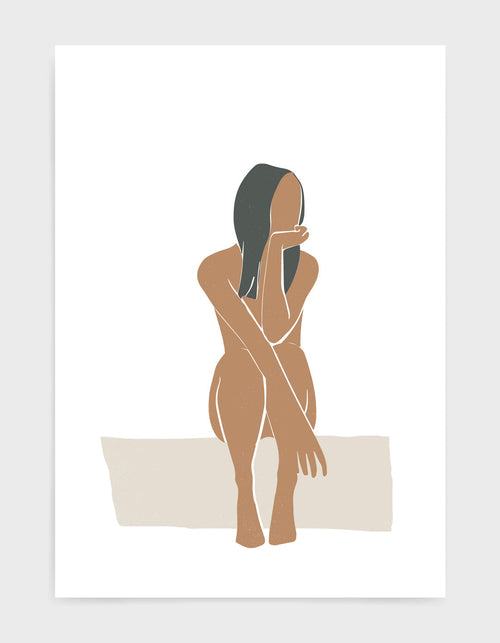 Nude woman sitting